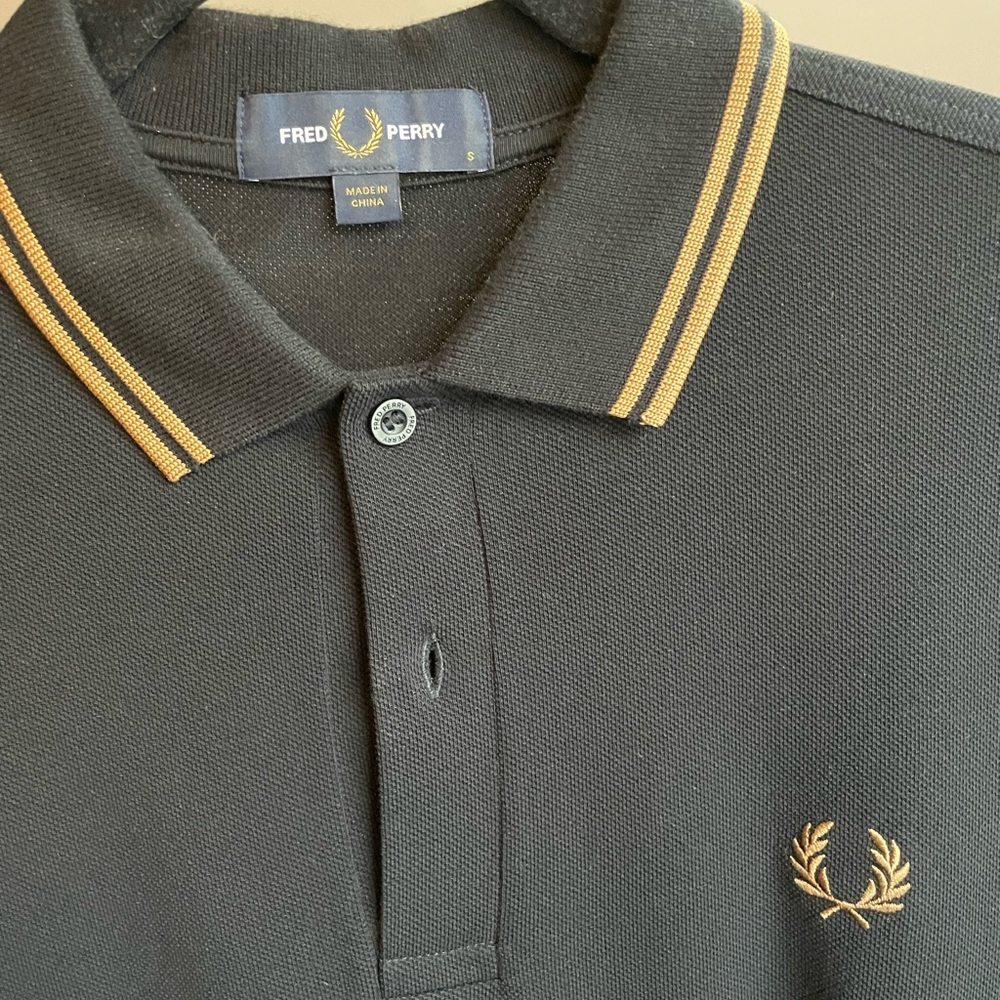 Fred Perry black/champagne twin tipped polo.